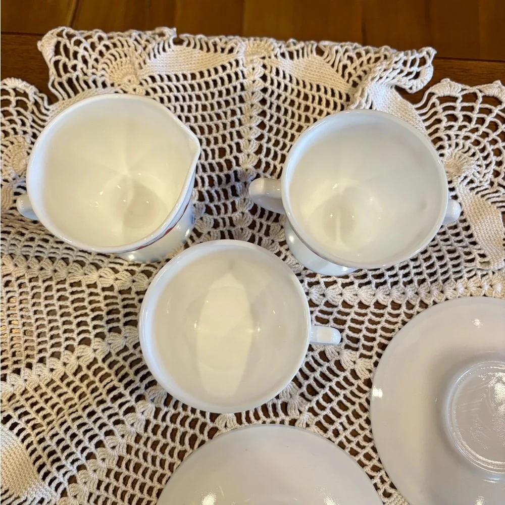 Vintage Shenango China cup and saucer set with a red diamond pattern